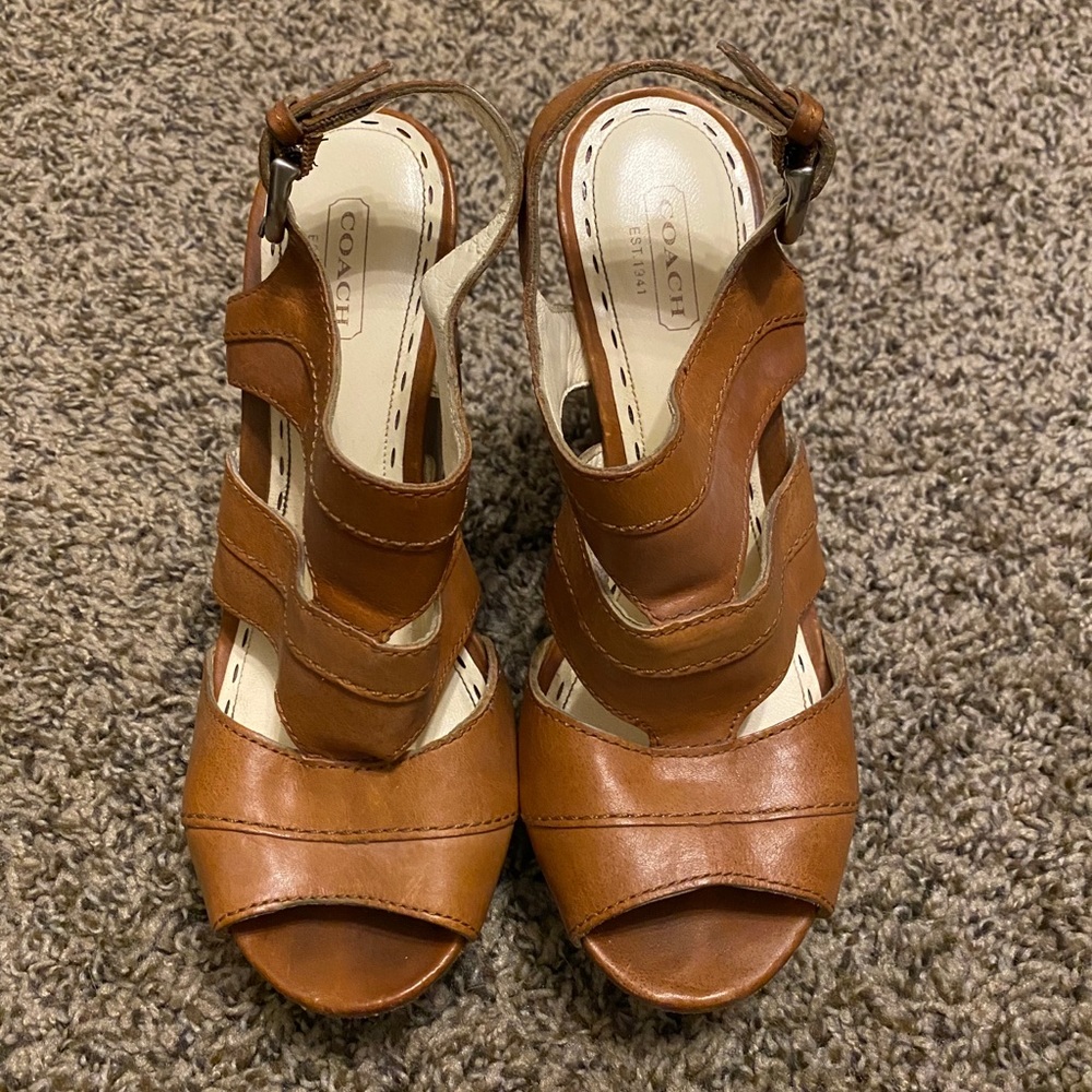Women’s Coach leather wedge.